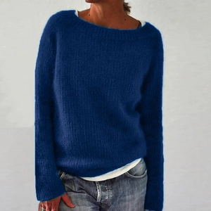 Close-up of dark blue knit sweater texture and round neck detail on a model