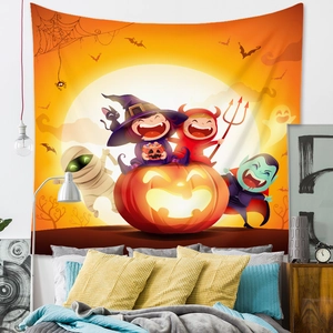 Macro detail of Halloween tapestry showing cartoon witch and pumpkin on bedroom wall