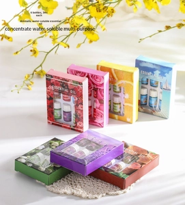 Detailed set of six 3ml water-soluble essential oil bottles with floral packaging boxes