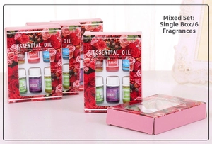 Detailed view of pink floral essential oil gift sets featuring six mixed water-soluble scents