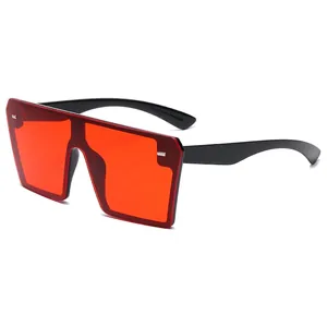 Retro oversized rimless square sunglasses with orange lenses and metal stud details