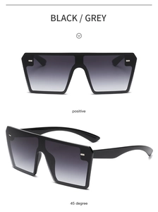 Front and side view of oversized rimless flat top sunglasses with silver stud details