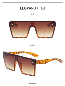 Detail view of leopard square frameless sunglasses with tea gradient lenses and metal studs