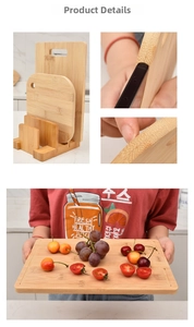 Detail view of double-sided thin bamboo cutting boards with a wooden storage stand