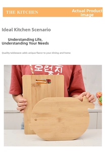 Detail showing natural bamboo wood grain on rectangular and fish-shaped cutting boards