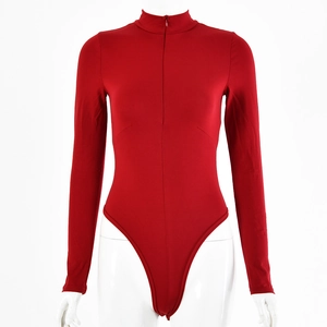 Detail of red long sleeve bodysuit featuring front zipper and stand collar design