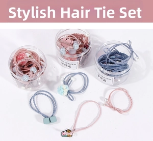 Detail of macaron pink and blue hair ties set with cylindrical storage jars