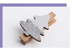 Close-up of wooden Christmas tree clip with silver glitter finish and natural wood texture