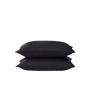 Set of two black luxury satin silk pillowcases with smooth glossy finish and soft texture