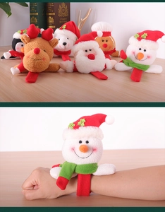 Christmas plush snap bracelets featuring Santa and reindeer shown on a wrist