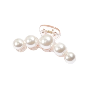 Elegant pearl hair claw clip with pink resin base and gold spring on white background