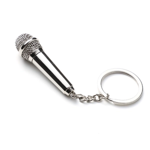 Polished silver microphone keychain made of zinc alloy with detailed mesh and ring