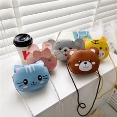 Close-up of colorful cartoon animal crossbody bags for kids in various animal styles