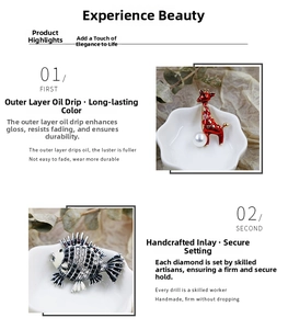 Detail of elegant giraffe and fish brooches with colorful enamel and pearl accents