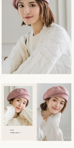 Close-up of knit plaid beret and cable knit sweater showing soft fabric textures