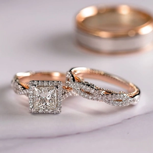 Three-piece rose gold halo ring set with princess cut zircon stones and twisted bands