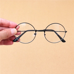 Lunettes rondes classiques en métal noir avec plaquettes de nez en silicone style vintage