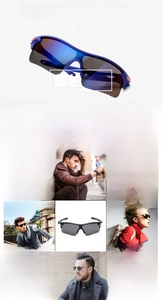 Detail of high-end sports sunglasses with oversized frames and blue gradient lenses