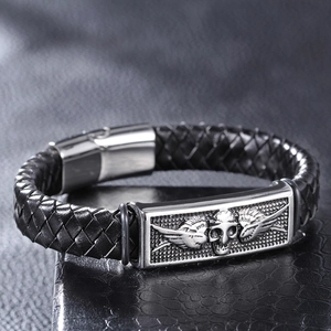 Men's retro black braided leather bracelet featuring silver stainless steel skull charm