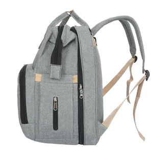 Large capacity multifunctional grey diaper backpack with foldable travel bed feature