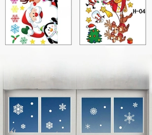 Detail of Christmas Santa and reindeer window static stickers for festive shop displays