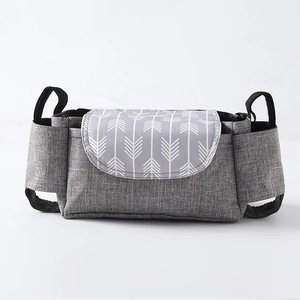 Universal gray stroller organizer with white arrow pattern and dual bottle holders