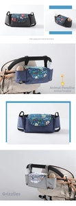 Detail view of universal stroller organizer with waterproof fabric and dual bottle holders