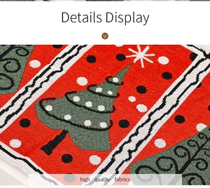 Close-up of high quality knitted Christmas placemat with green tree and snowflake patterns