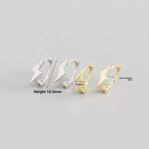 Macro view of lightning bolt hoop earrings in silver and gold with size dimensions