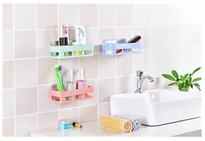 Adhesive wall-mounted bathroom storage baskets with drainage holes in multiple colors