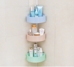 Vertical wall-mounted corner shower caddies in blue, pink, and green plastic finish