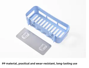 Detail of light blue rectangular PP storage shelf with hollow drainage holes and adhesive