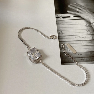 Detailed close-up of 925 sterling silver bracelet featuring a large square zircon stone