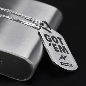 Silver military dog tag necklace with GOT 'EM SHOCK engraving on stainless steel