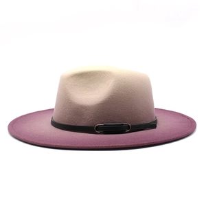 Detail of gradient felt fedora hat showing beige to purple fade with black leather band