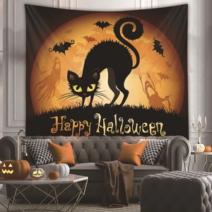 Detail of Halloween tapestry with black cat and Happy Halloween text above sofa