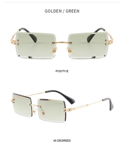 Close-up of frameless square sunglasses with green lenses and gold metal temple detail