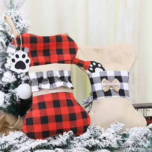 Dog bone Christmas stockings in red buffalo plaid and burlap for festive home mantel decor
