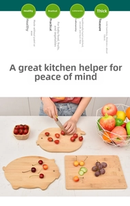 Close-up of double-sided solid bamboo cutting boards with pig shape and smooth wood grain