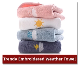 Detail of four-color cotton towels with weather-themed embroidery in soft macaron tones