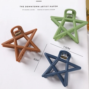 Hollow star hair claws in brown green and blue available in 6cm and 7.5cm sizes