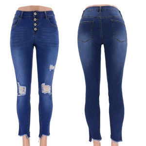Front and back detail of high-waisted distressed skinny jeans with four-button fly closure