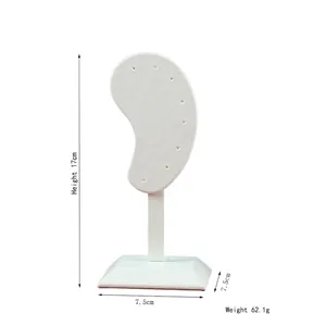 White microfiber ear-shaped jewelry stand with 8 holes for earring display and measurements