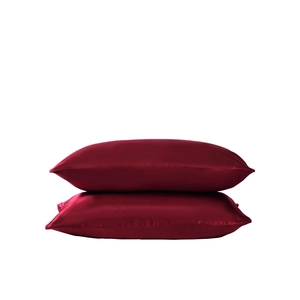 Luxurious red satin silk pillowcases set of two with smooth glossy finish on white background