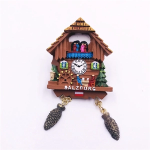 Detailed resin souvenir magnet of a Salzburg Cuckoo Clock with pine cone pendants