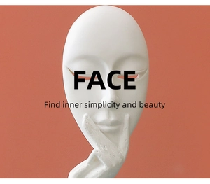 Close-up of minimalist white abstract face mask sculpture with matte ceramic texture