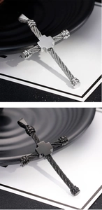 Detailed comparison of twisted cable cross pendants in silver and black stainless steel
