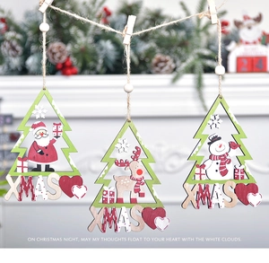 Detailed view of handcrafted wooden Santa, reindeer and snowman Christmas ornaments