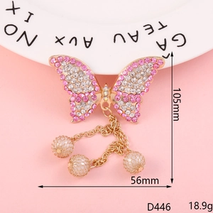 Pink and white rhinestone butterfly brooch with pearl pendant on 105mm gold base