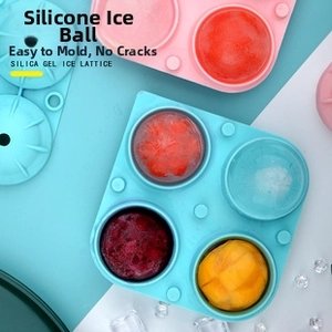 Close-up of four-hole silicone spherical ice ball mold in blue and pink colors